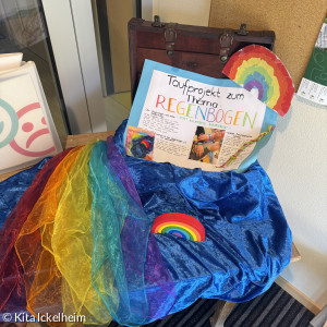 Taufkoffer mit Regenbogen